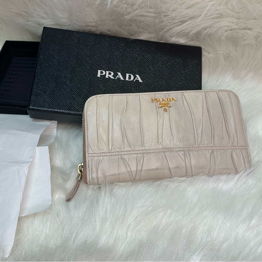 Authentic Prada Nappa Gaufre ivory lambskin zip around wallet vintage